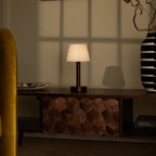 Zoe cordless lamp side view showing dark rubberwood base