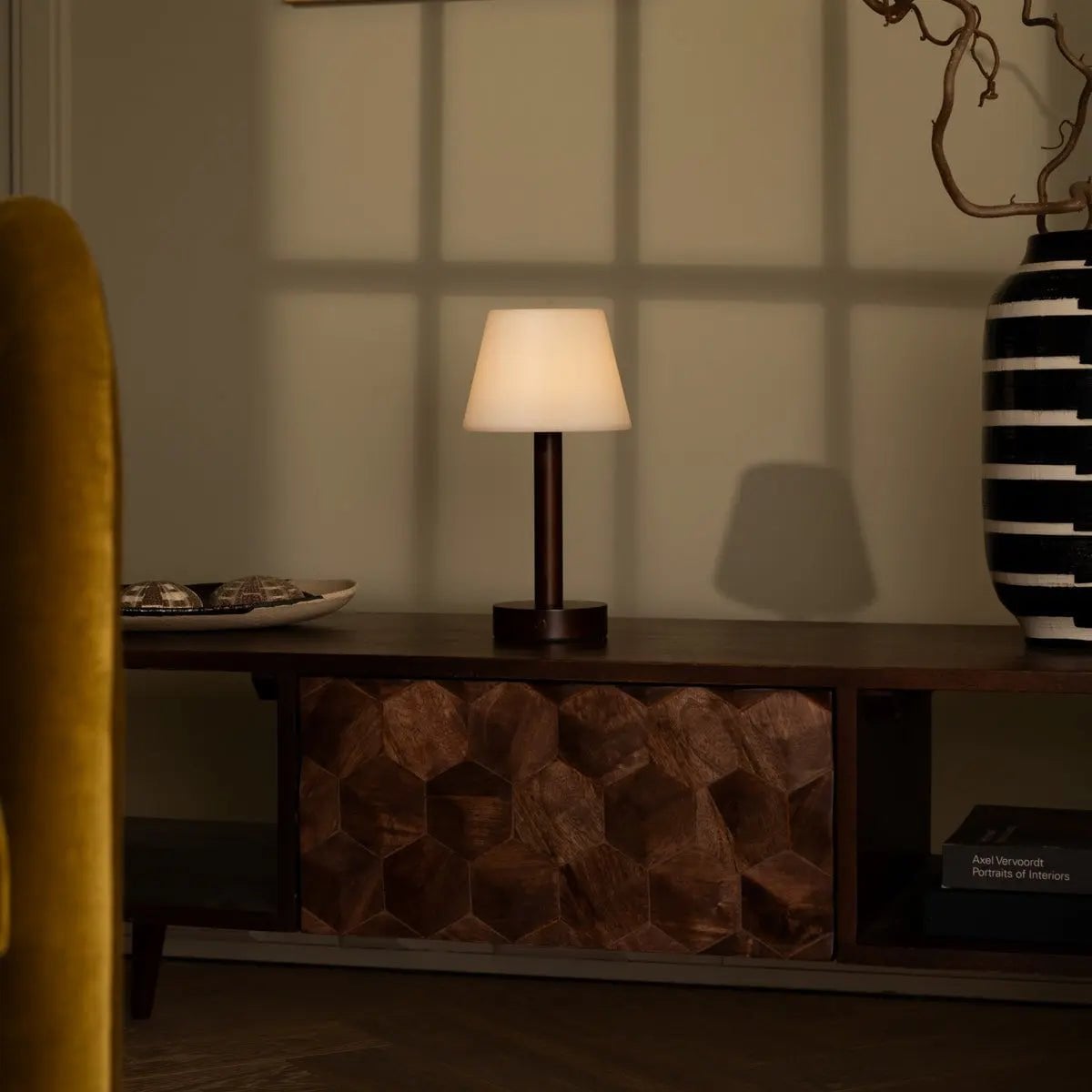 Zoe cordless lamp side view showing dark rubberwood base