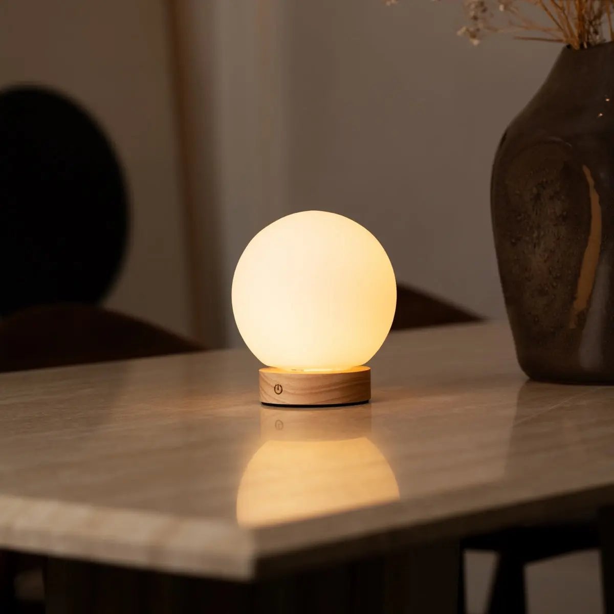 Flore rechargeable lamp in living room console