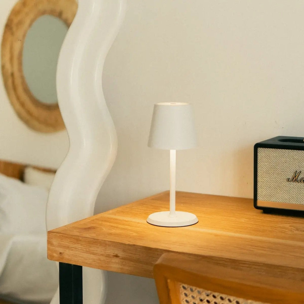 James metal lamp in living room console setting