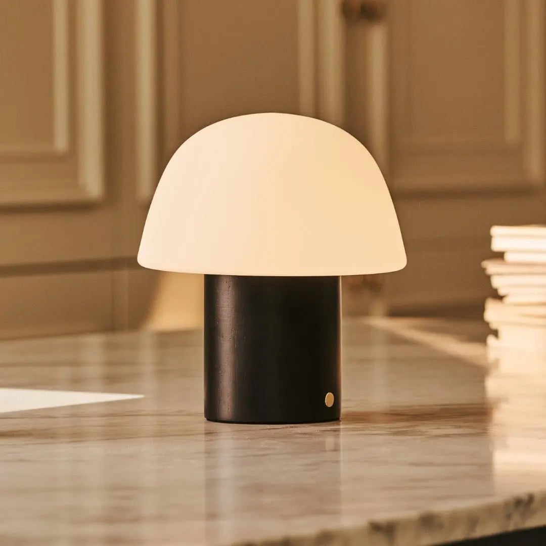 Yannick cordless lamp detail of frosted glass shade