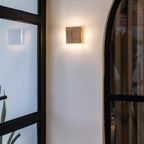 Lane rechargeable wall lamp mounted in hallway setting
