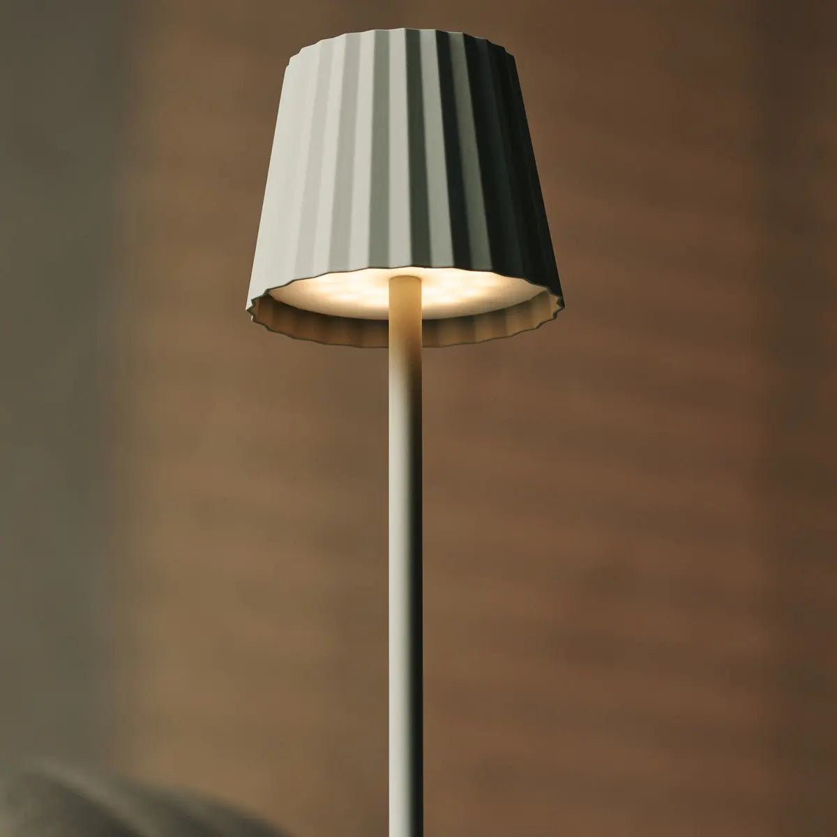 Maya shadow grey rechargeable lamp on bedside table