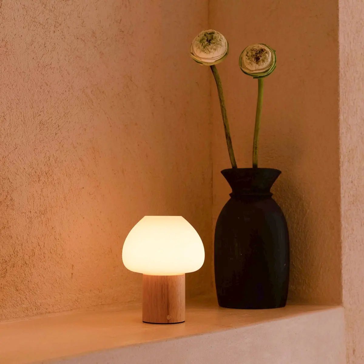 Fynn cordless lamp detail of glass element and rubberwood