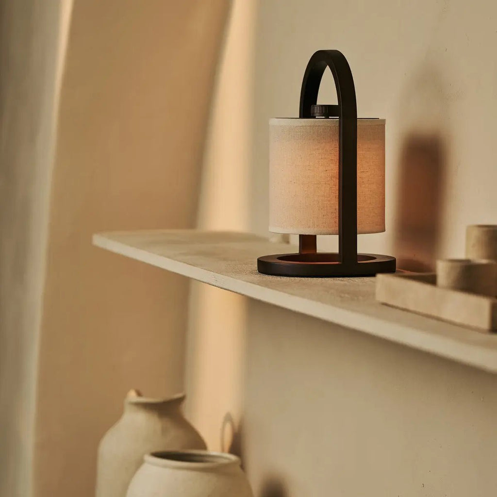 River dark rubberwood table lamp in Scandinavian interior