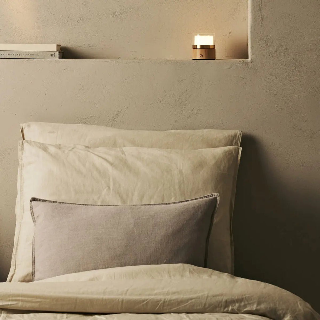 Leo rechargeable lamp warm ambient glow on shelf
