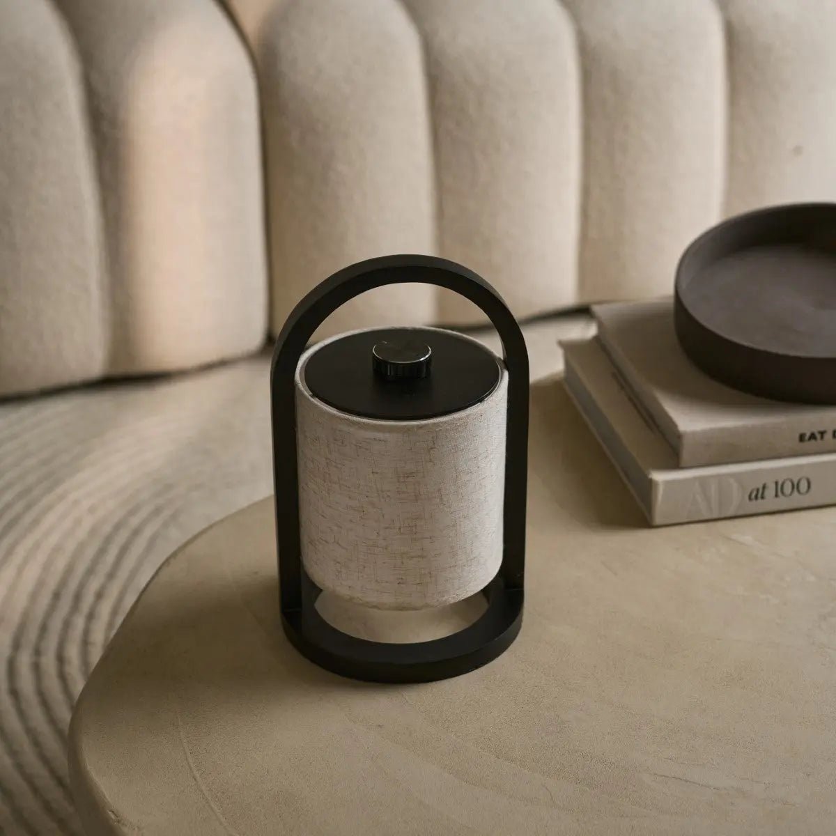 River rechargeable lamp in living room console