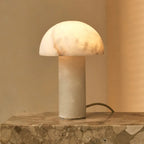 Francesco alabaster cordless table lamp warm translucent glow
