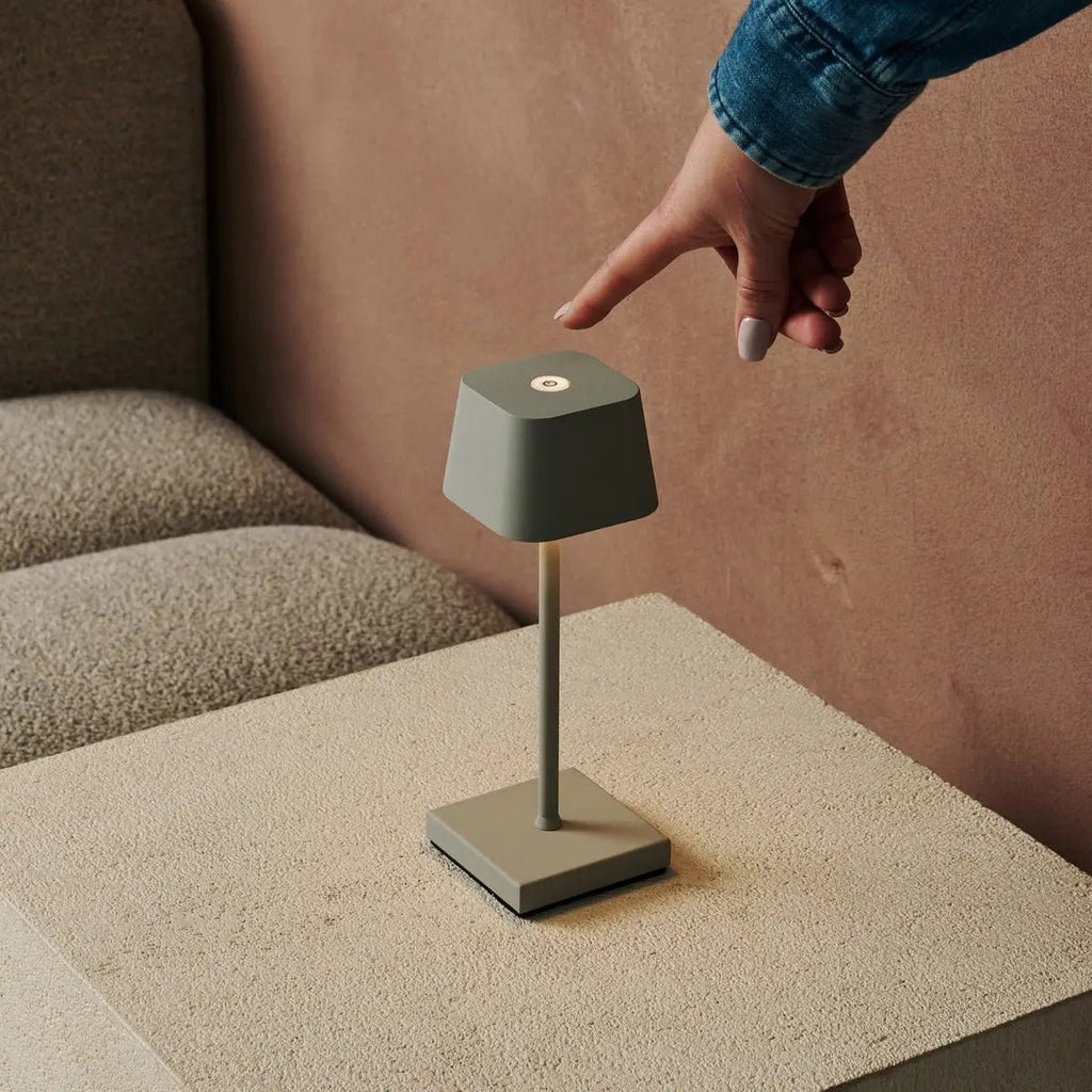 Sarphati rechargeable lamp in hotel lobby setting