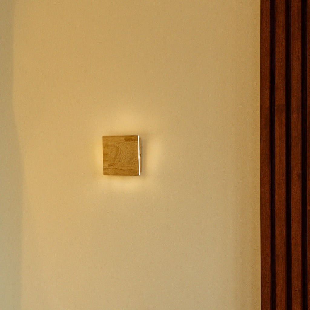 Lane rechargeable wall lamp in bedroom above headboard