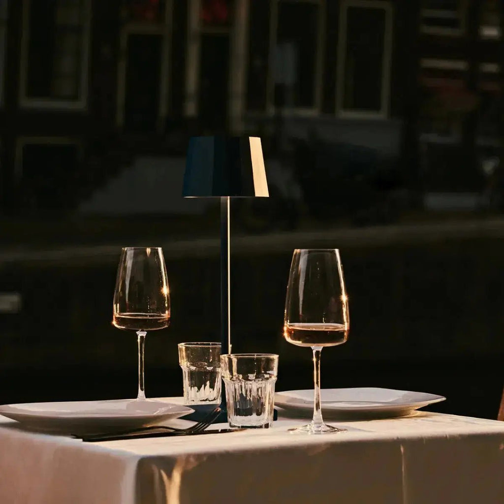 Wouter rechargeable lamp in hotel lobby setting