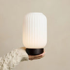 Lilly wood lamp on bedside table ambient mode