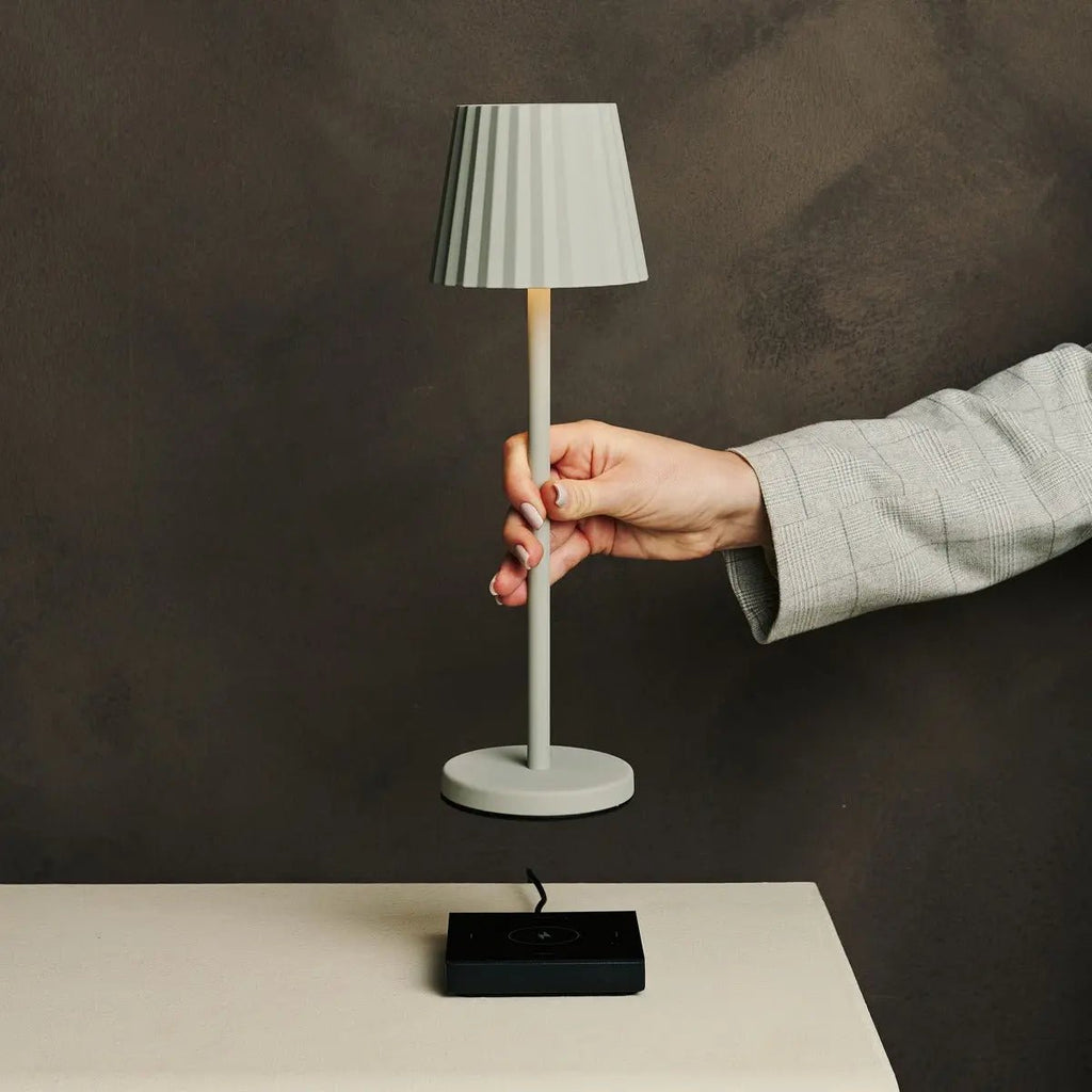 Maya shadow grey metal lamp on hotel console table