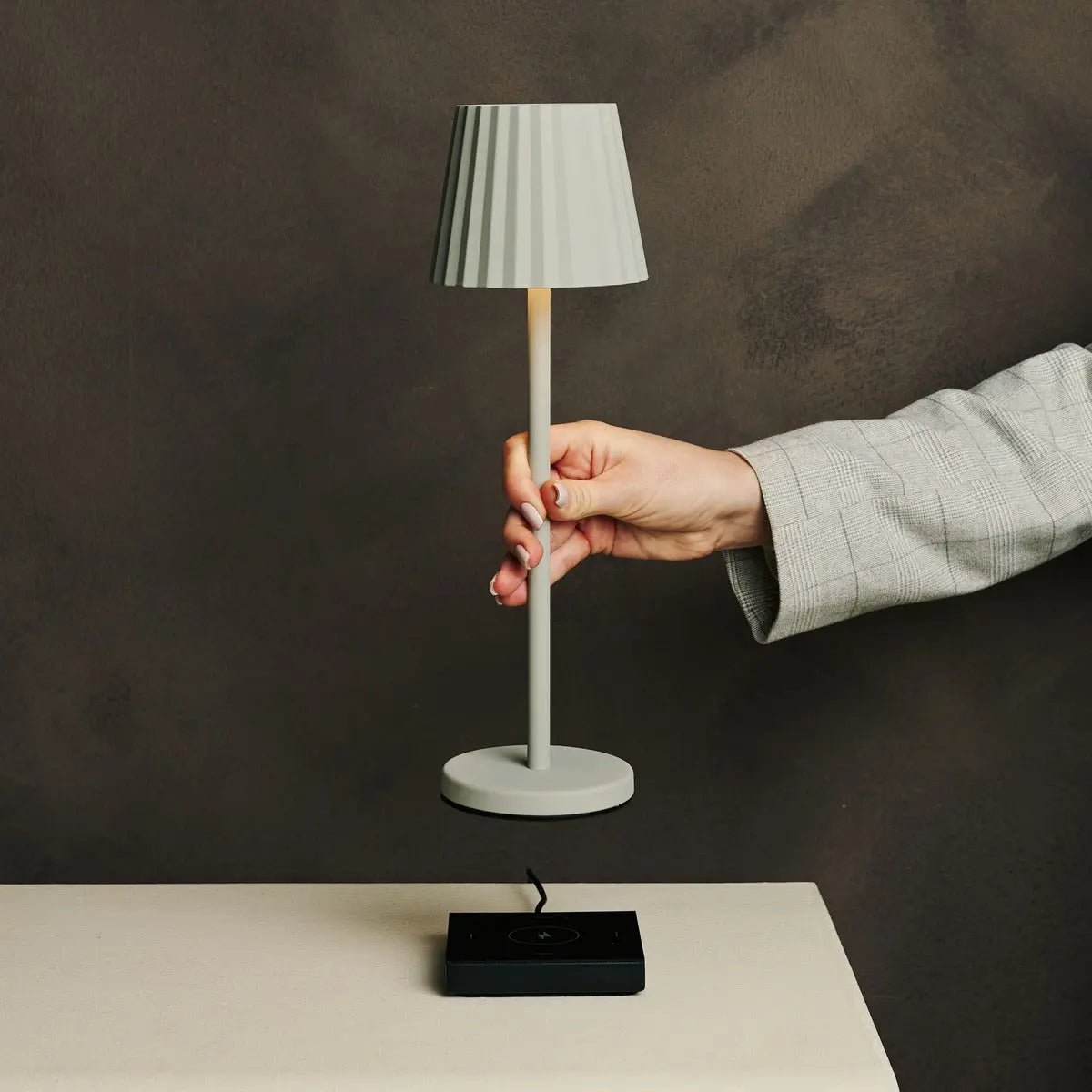 Maya shadow grey metal lamp on hotel console table