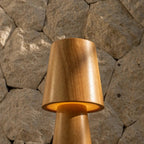 Lucas cordless lamp side view showing slender rubberwood form