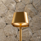 Ava rechargeable lamp warm ambient glow on bedside table