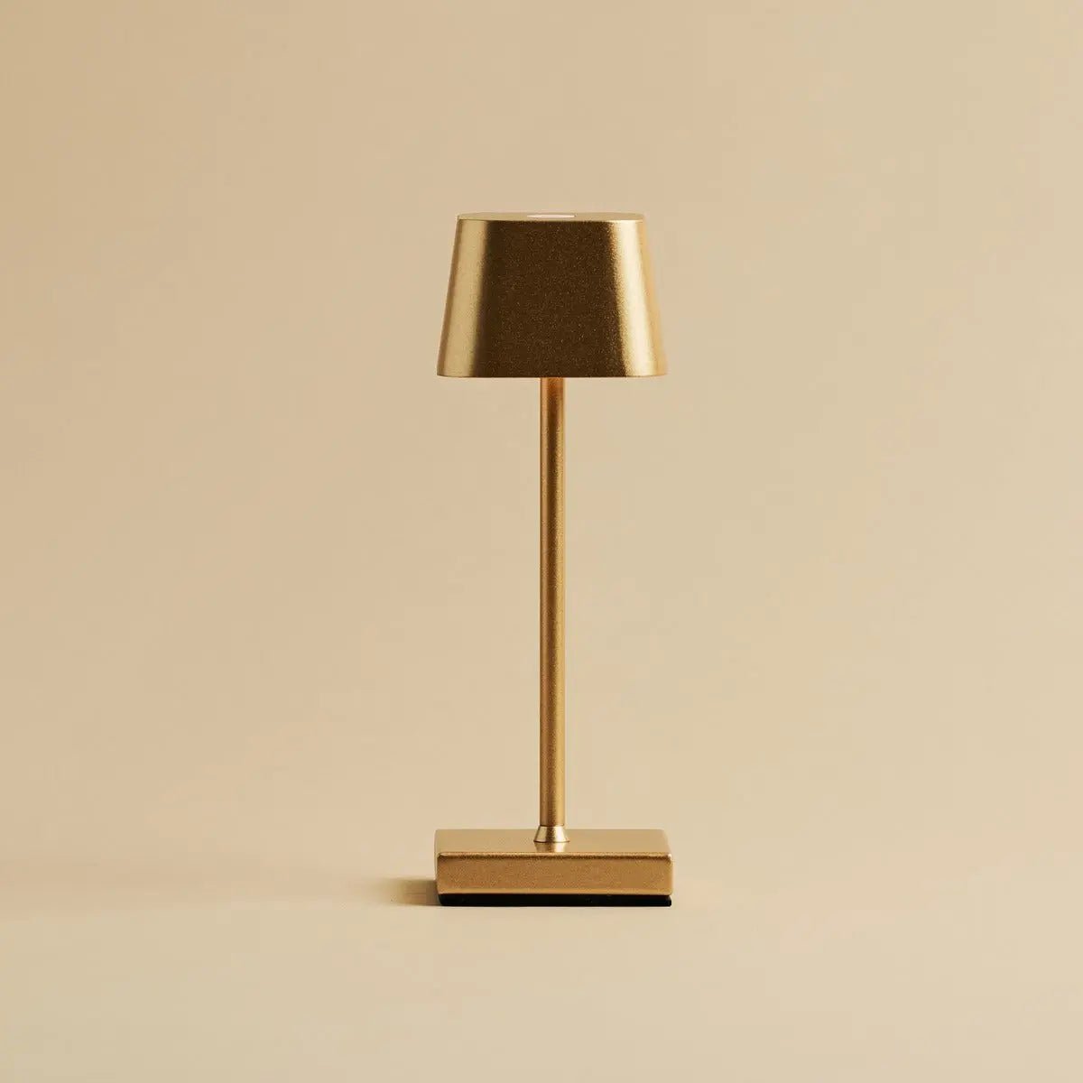 Sarphati gold metal lamp at full brightness