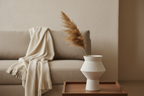 White speckled ceramic vase on a walnut side table in a warm minimal living room
