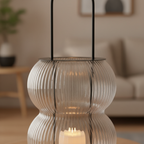 Close-up of Lucena lantern ribbed glass texture and black metal frame with warm candlelight glow