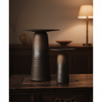 ULFUR ceramic vases in 35cm and 28cm sizes grouped on a dark oak sideboard in a warm moody interior
