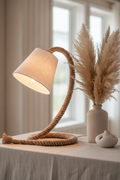 Touw natural rope table lamp with white textile shade on linen surface with pampas grass