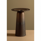 Close-up of the bronze-to-black glaze and two-part architectural form of the Ulfur ceramic vase